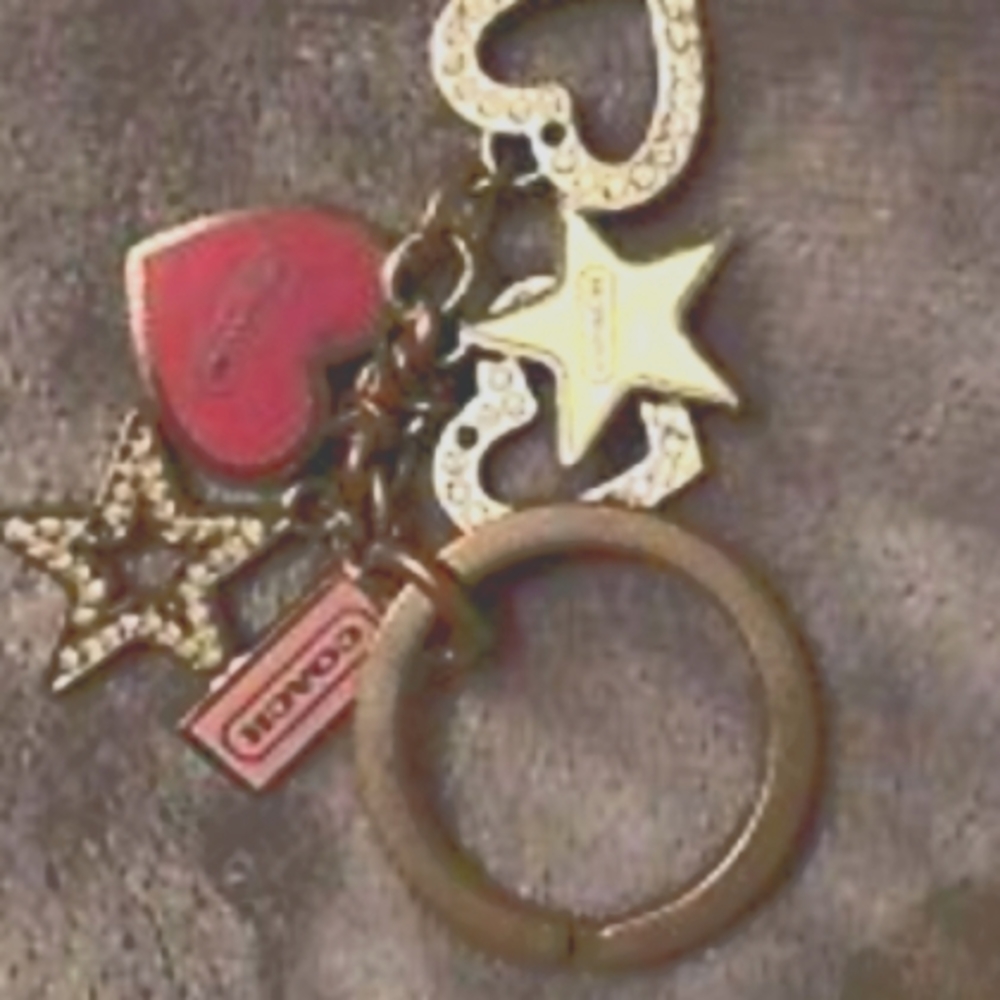 Authentic NWOT Coach Fob silver hearts multicharms